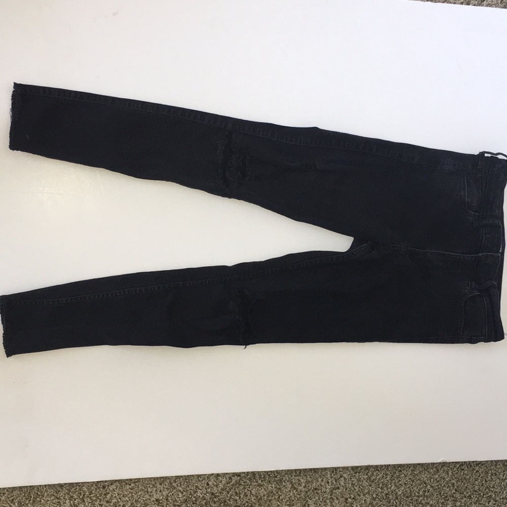 Woman’s black high rise jeans